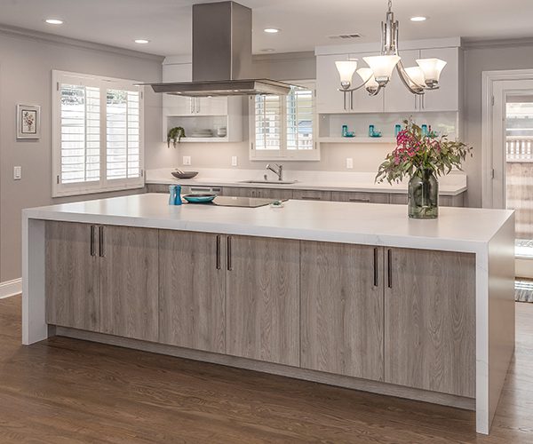 Handleless cabinets in a kitchen remodel can make the space appear bigger