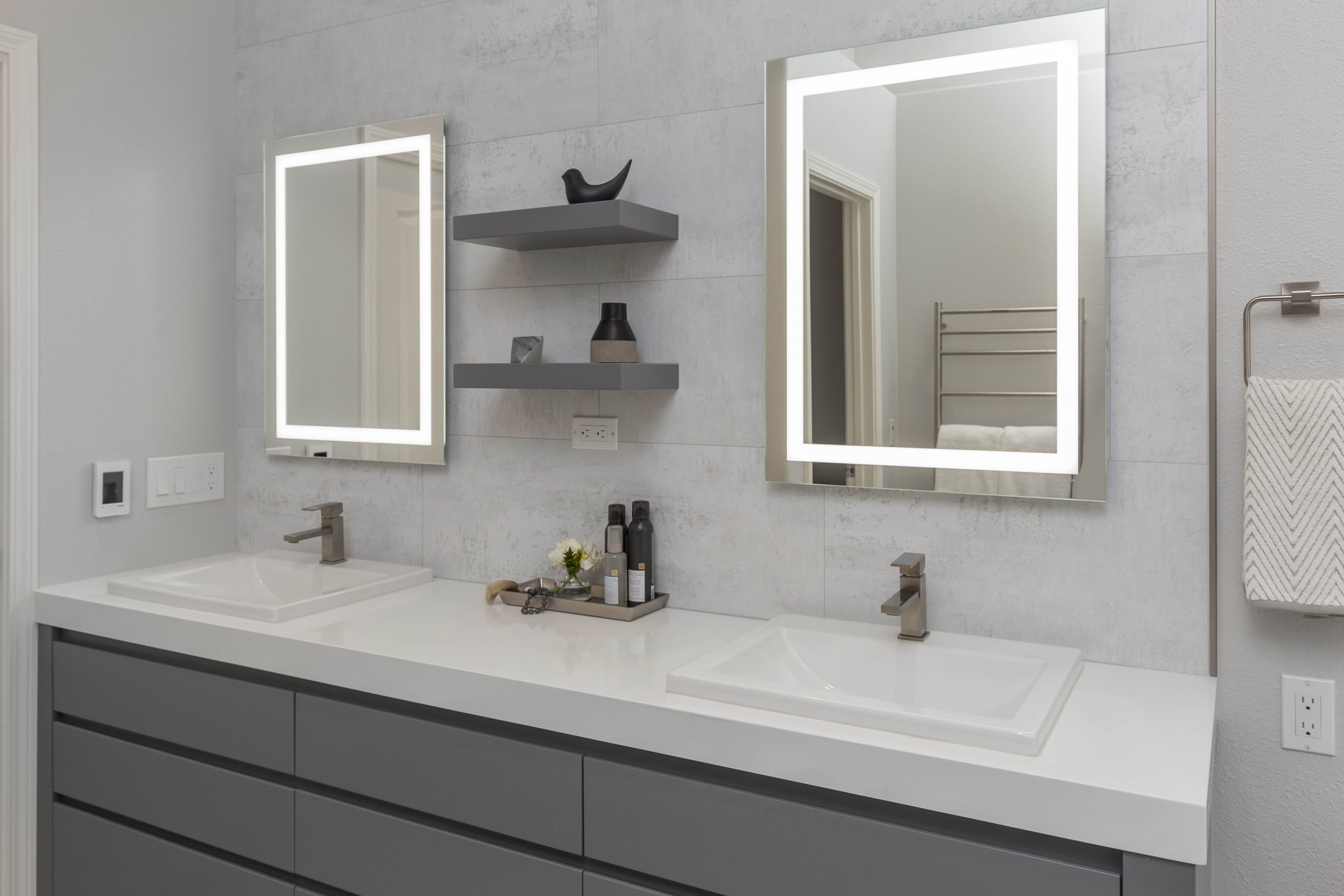 An emphasis on clean cut lines in a bathroom remodel also helps make the space seem bigger