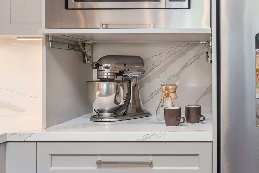 a pair of coffee mugs and a stand mixer; home renovation trends for 2020 will be impacted by how much more we've been cooking