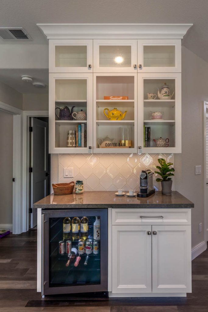 these remodeled kitchen cabinets have adds for storage and style