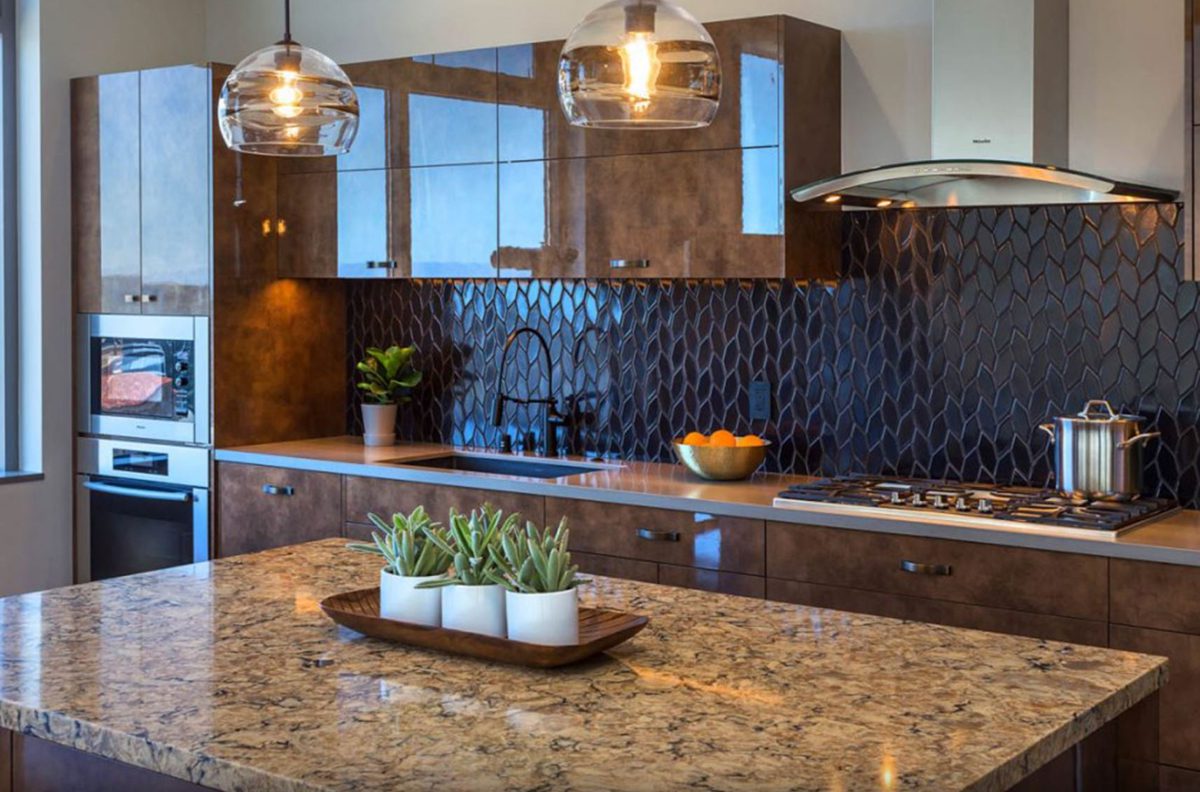 these glossy, teak-inspired cabinets keep this kitchen renovation colorful, while staying true to some of the homeowners' favorite furniture from their travels